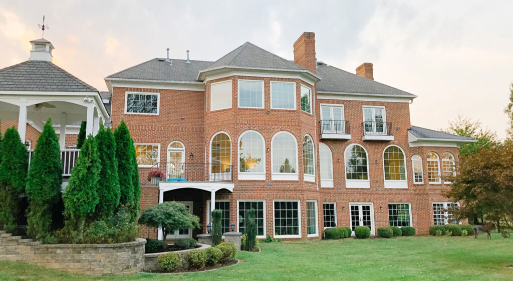The Arched Manor with new black windows!