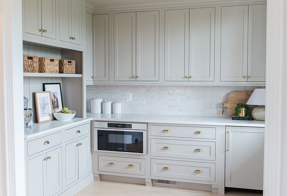This custom pantry went from a dark, two pantry design to an open, light and bright custom walk in pantry!
