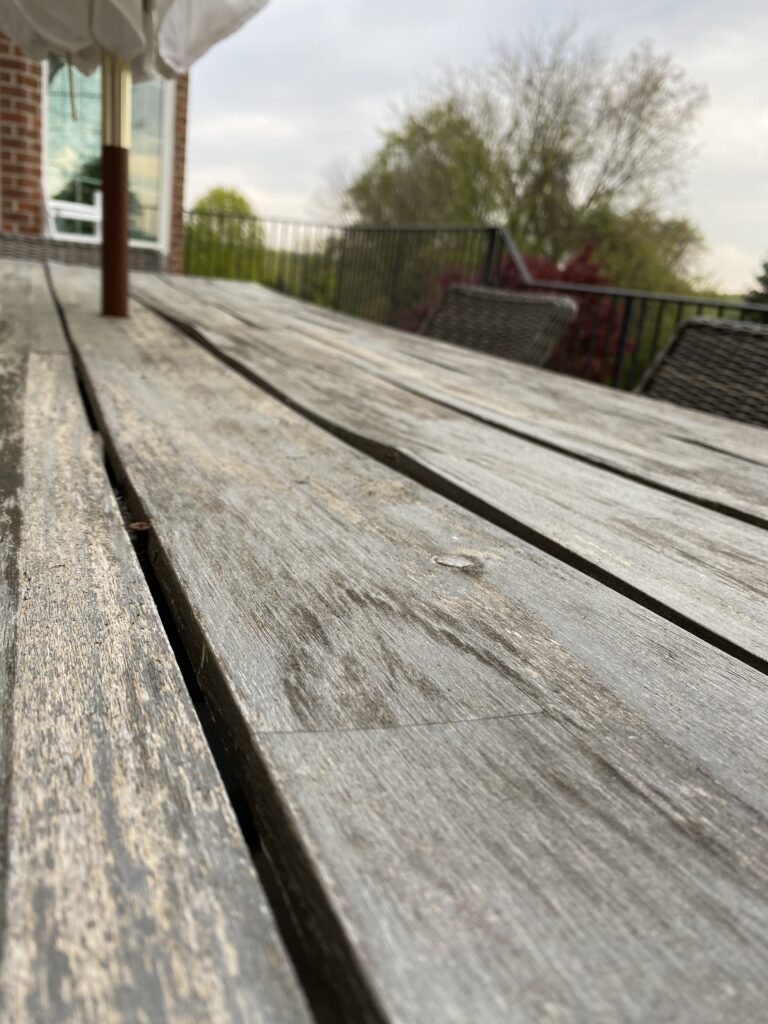 Warped wood, chipping paint, and splinters galore. Time for a new outdoor table!