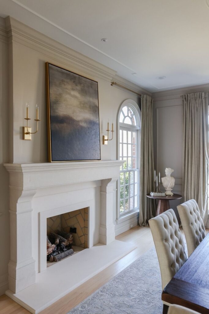 Brass sconces in dining room