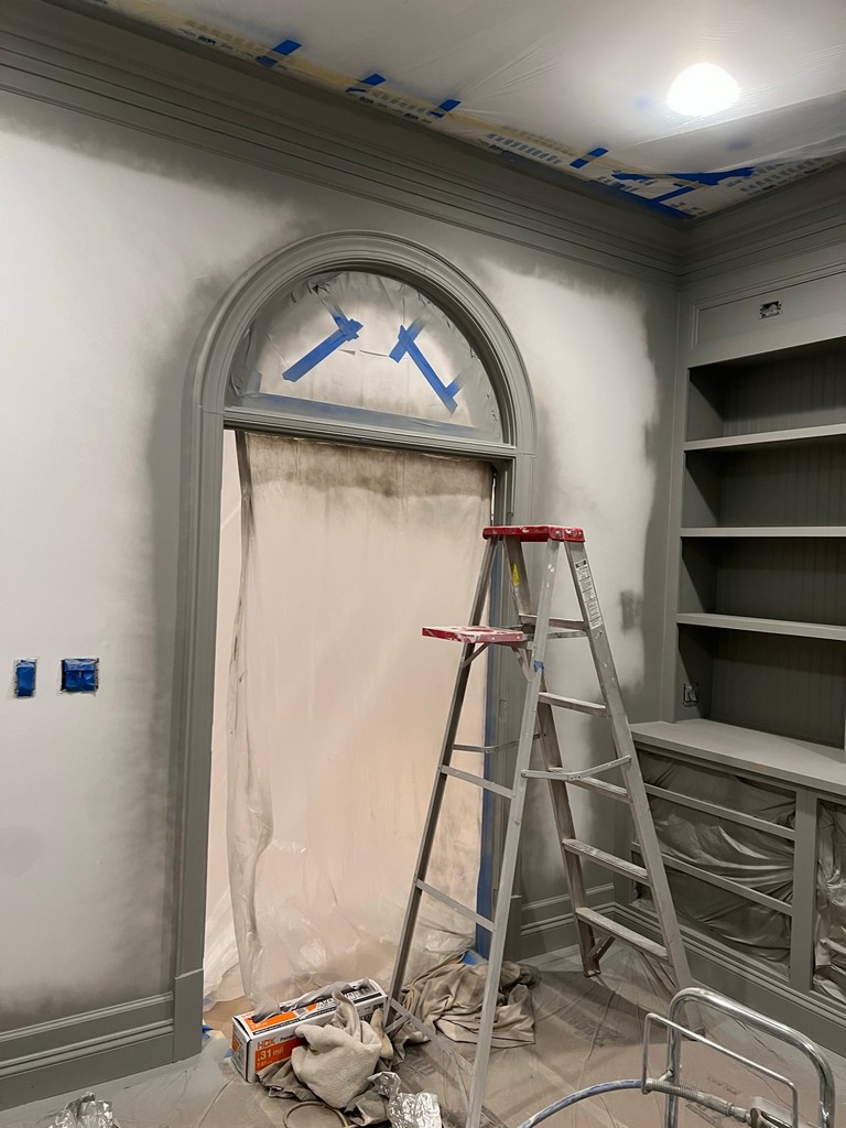 Office Built-in Shelves in our home office! Primer on the doorway.