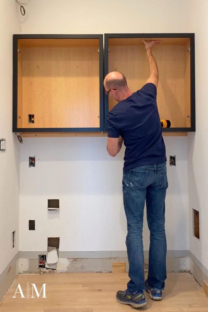 How high to hang upper kitchen cabinets
