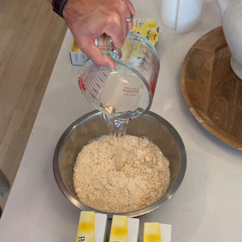 Use a large mixing bowl that can hold one box of pancake batter.