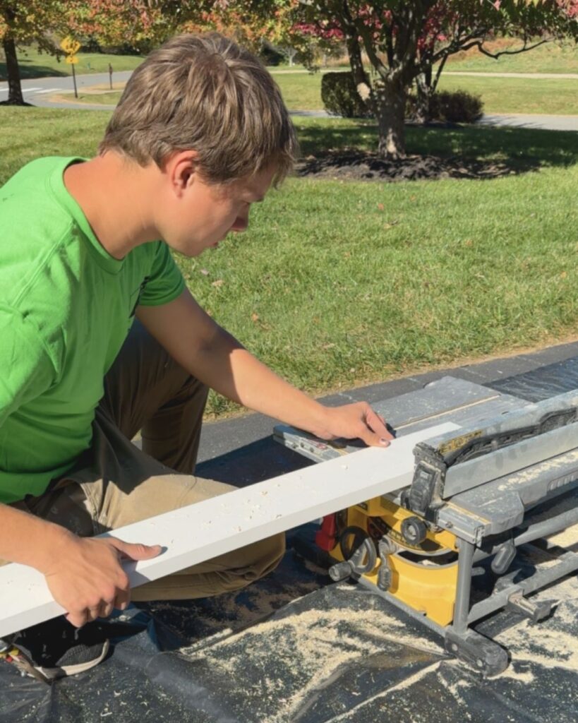 The window casing was carefully cut and assembled outside and brought in when complete.
