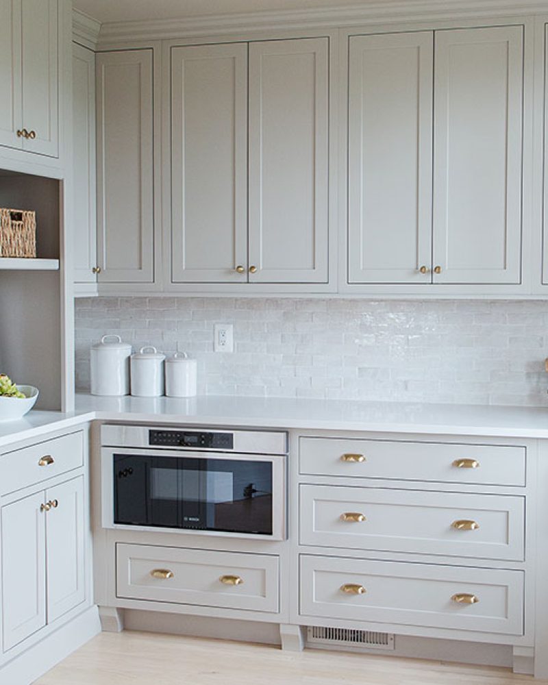 This custom pantry went from a dark, two pantry design to an open, light and bright custom walk in pantry!